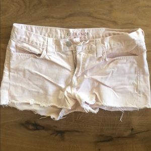 Jbrand cutoff short in “romantic” light pink denim